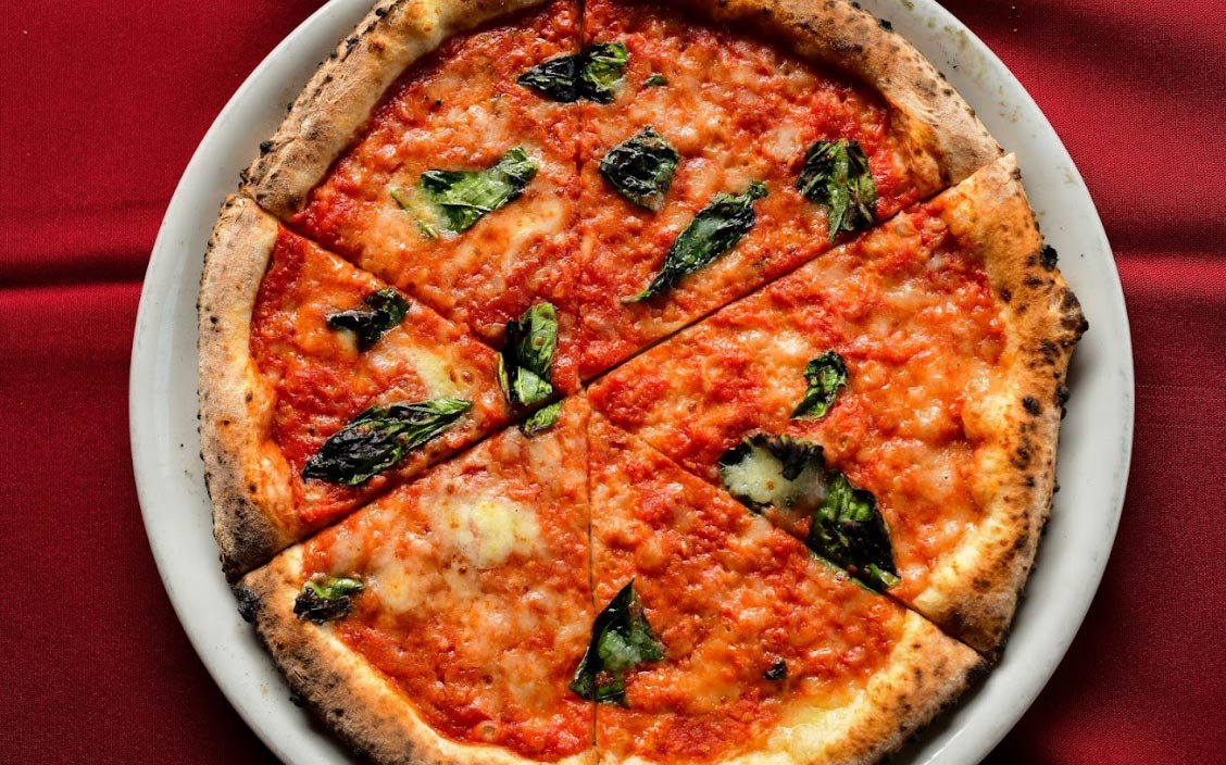 Pizzeria Rustica signature dishes Margherita Pizza
Quattro Stagioni Pizza
Cinque Formaggi Pizza